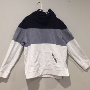 An Under Armour sweatshirt with a turtle neck.
